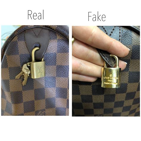 louis vuitton lock real vs fake|authentic louis vuitton bag identification.